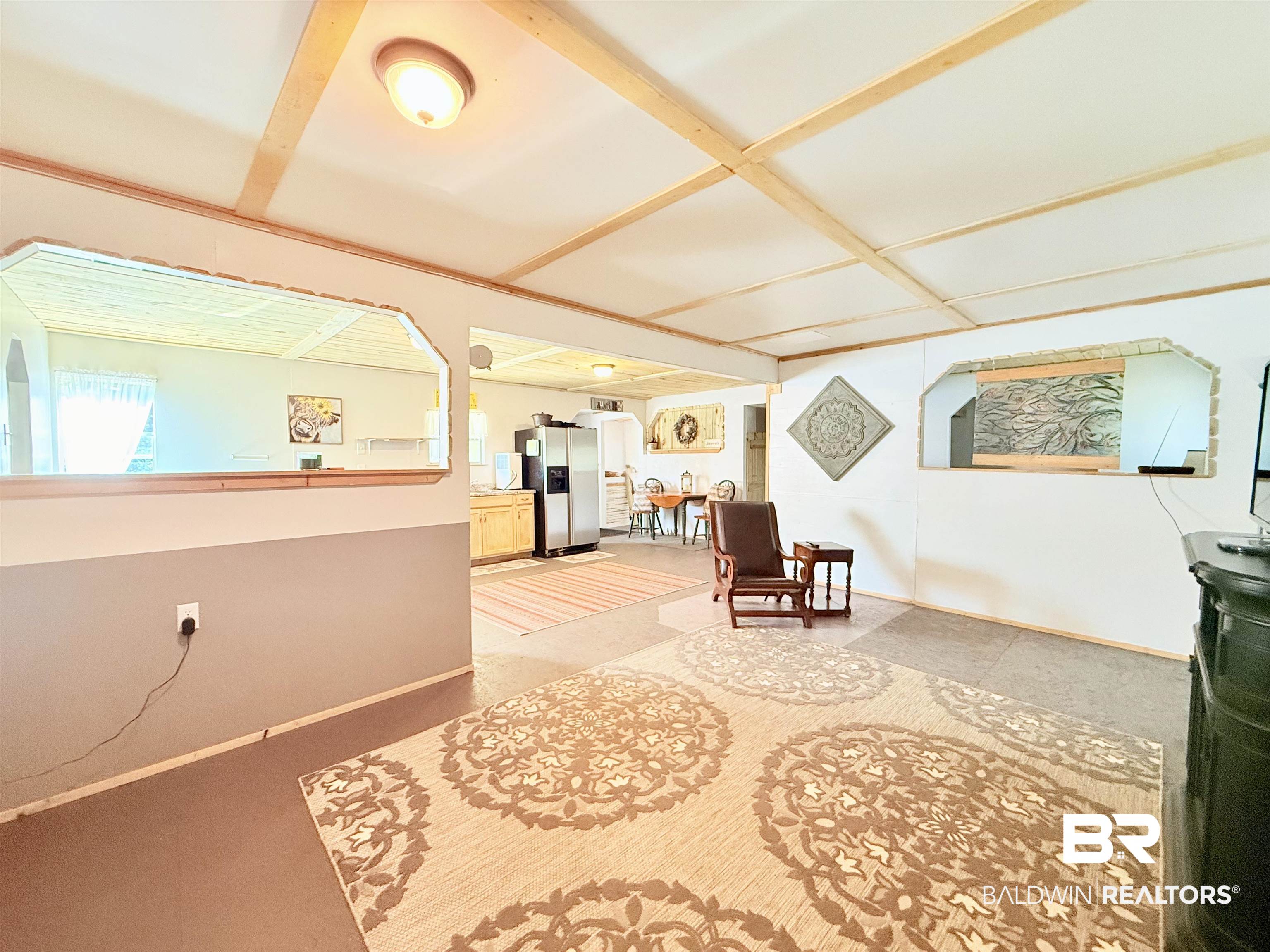 21305 River Road Robertsdale, AL 36567 - Photo 24 of 50 Living area featuring baseboards