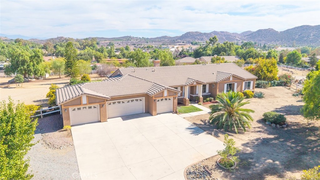 17920 Pony Butte Court Perris, CA 92570 - Photo 1 of 1 a view of a house with a mountain in the background
