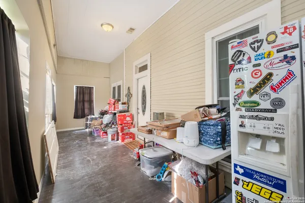 a room with furniture and musical instruments