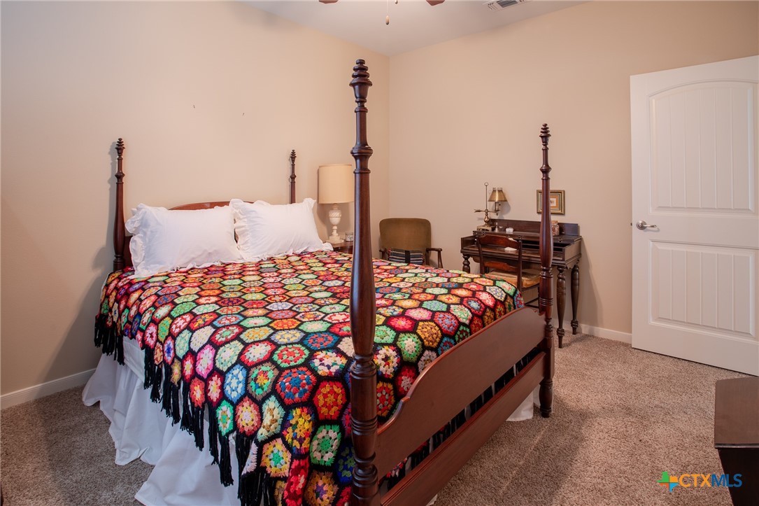 102 Luke Court Victoria, TX 77904 - Photo 25 of 33 a bedroom with bed and a closet