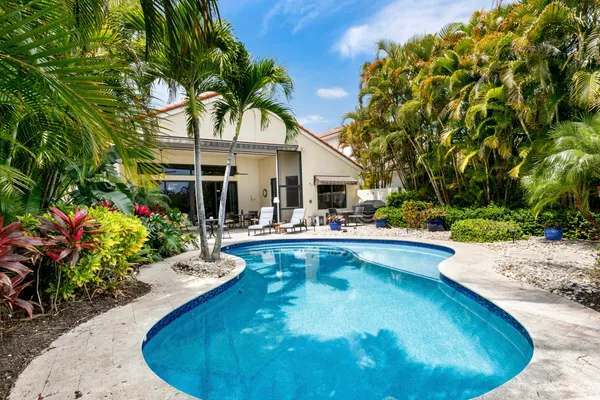 a view of a house with swimming pool