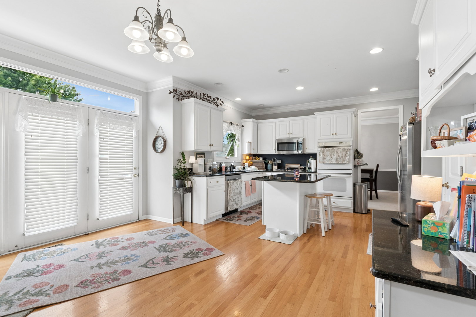 3744 Highknob Circle Naperville, IL 60564 - Photo 6 of 20 a kitchen with white cabinets and counter space