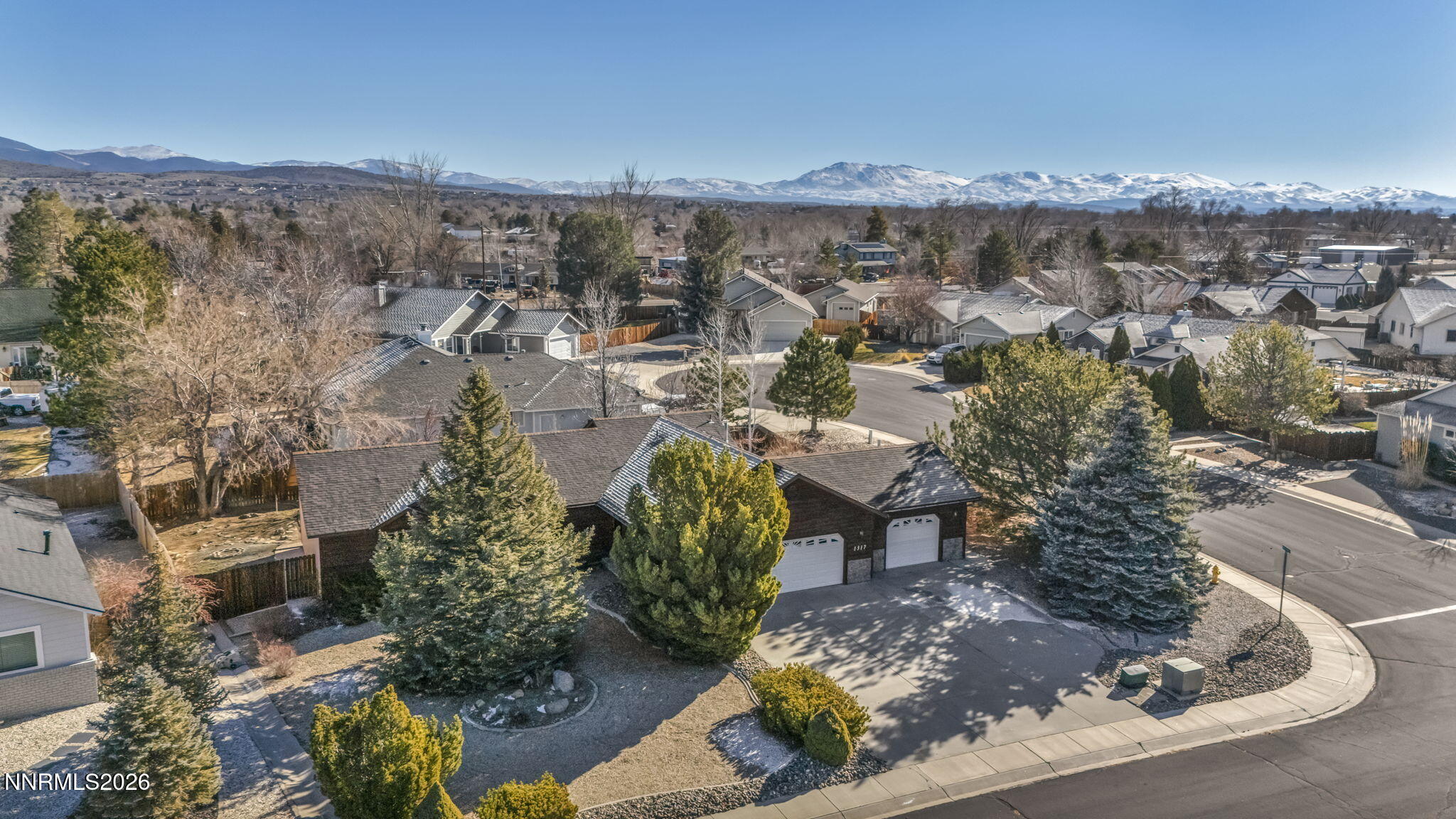1317 Bridle Way Minden, NV 89423 - Photo 11 of 57 an aerial view of a house with a yard and lake view