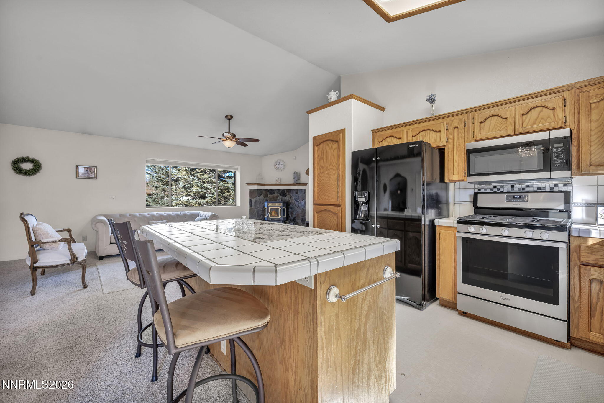 1317 Bridle Way Minden, NV 89423 - Photo 29 of 57 a kitchen with a stove and a refrigerator
