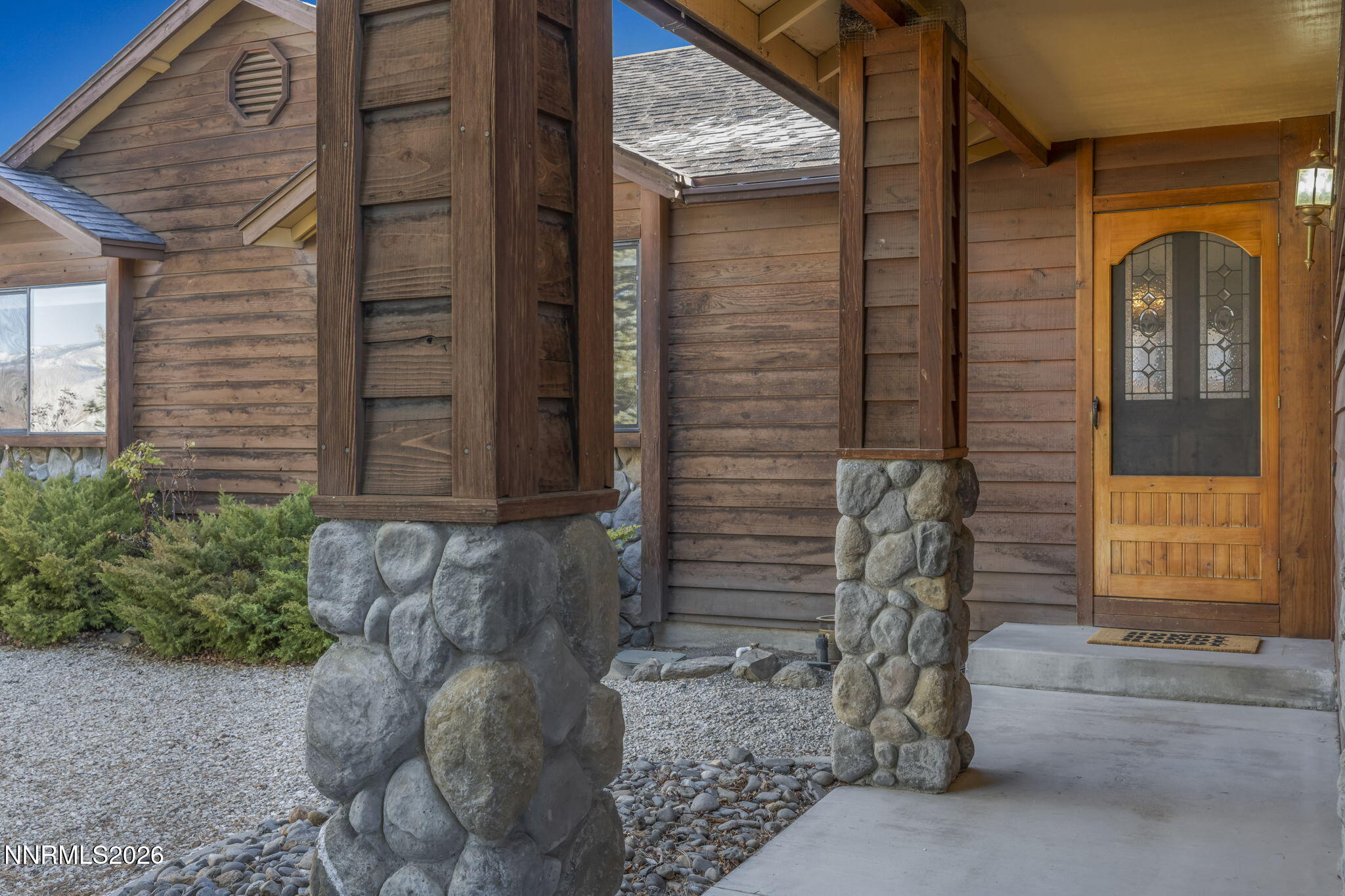 1317 Bridle Way Minden, NV 89423 - Photo 3 of 57 a front view of a house with a yard