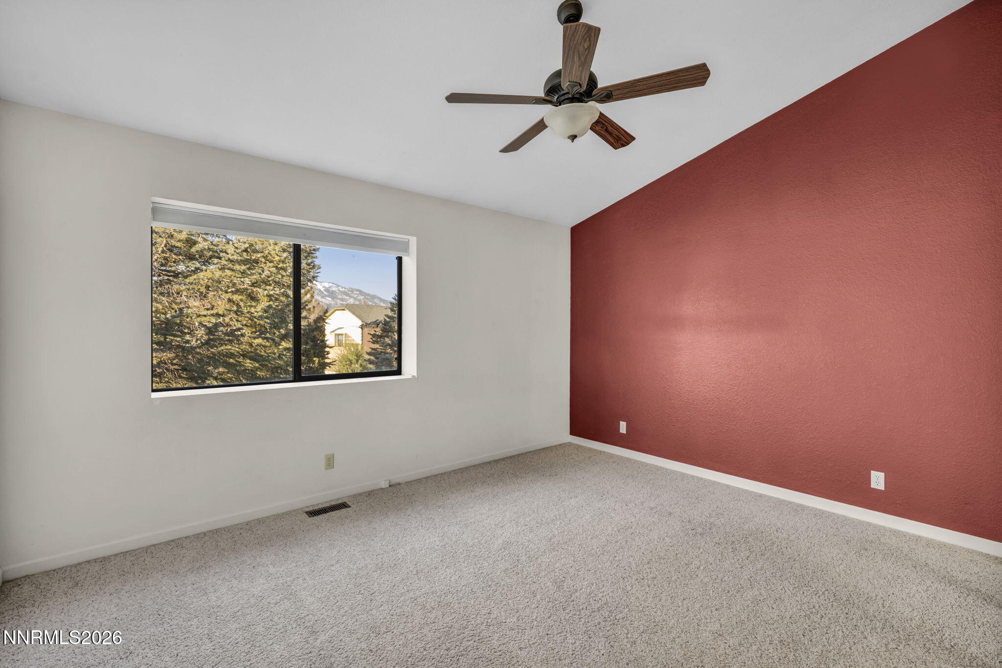 1317 Bridle Way Minden, NV 89423 - Photo 32 of 57 a view of an empty room with a window