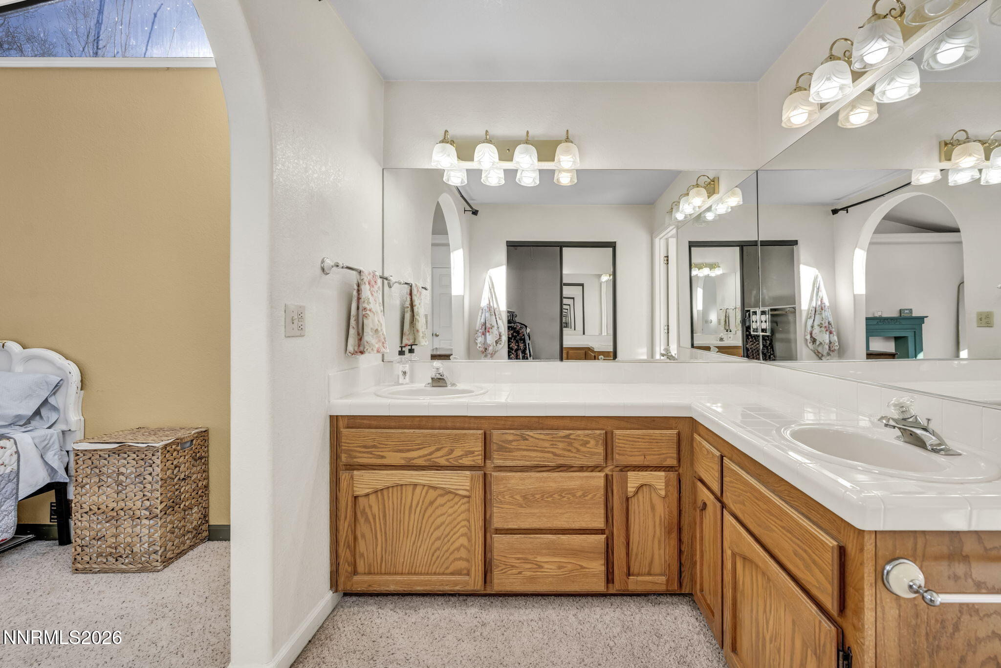 1317 Bridle Way Minden, NV 89423 - Photo 39 of 57 a spacious bathroom with a double vanity sink mirror and