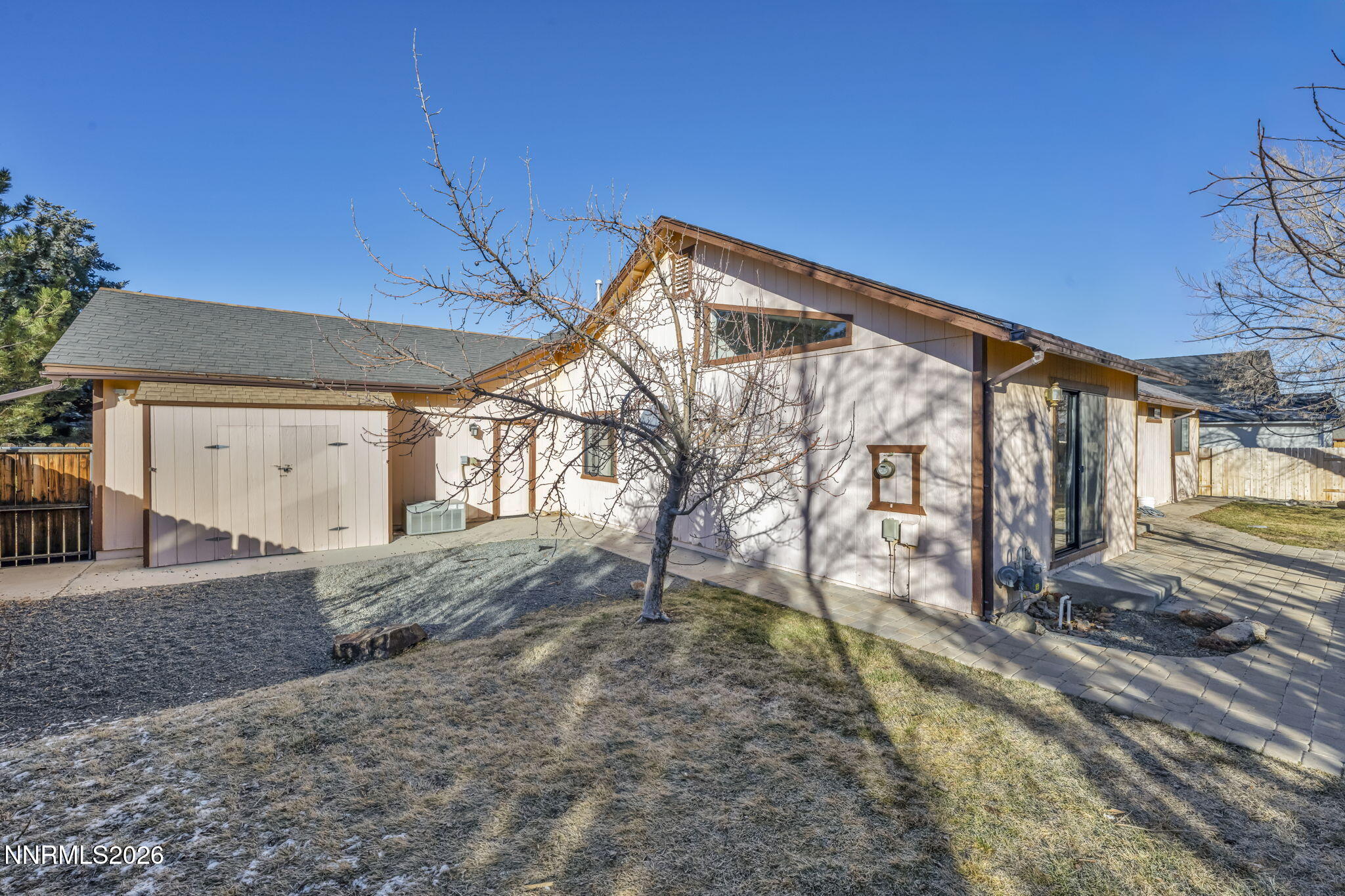 1317 Bridle Way Minden, NV 89423 - Photo 49 of 57 a backyard of a house with large trees