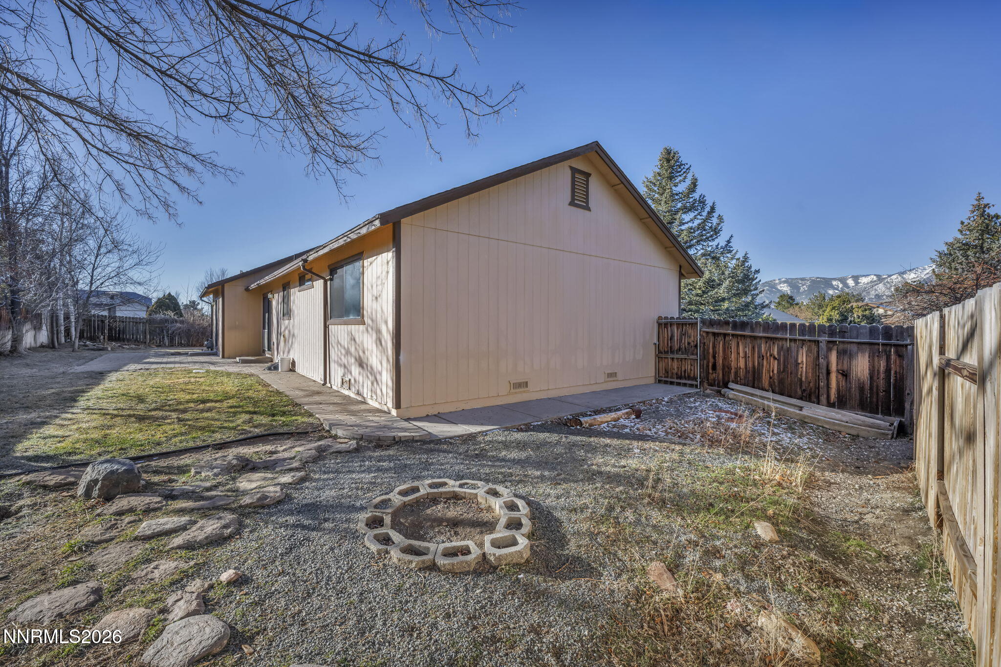 1317 Bridle Way Minden, NV 89423 - Photo 57 of 57 a backyard of house with trees