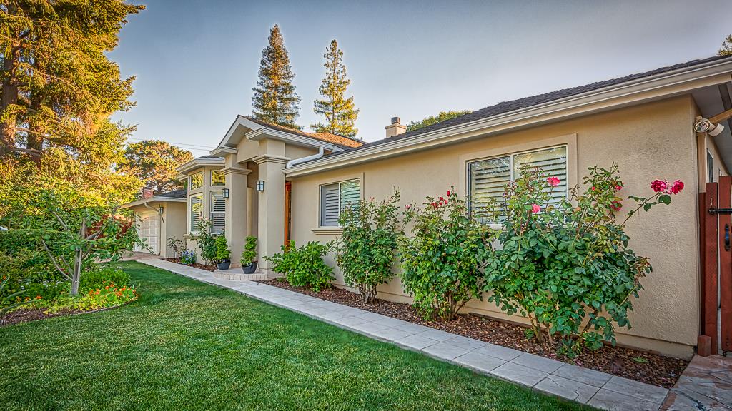 1952 Fallen Leaf Lane Los Altos, CA 94024 - Photo 2 of 23 a front view of a house with a yard