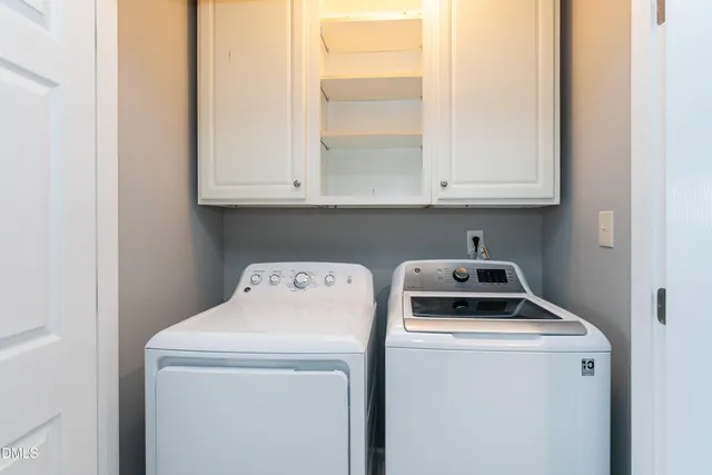 a room with dryer and washer