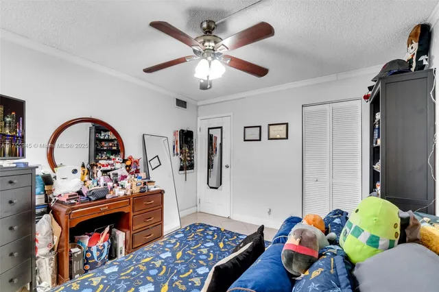 a bedroom with furniture and a fireplace