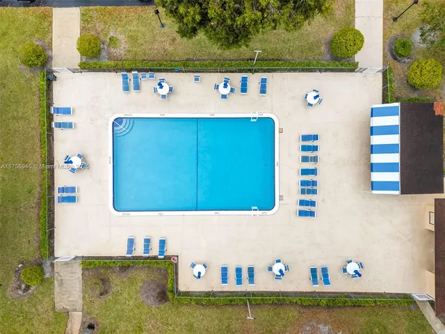 a view of a building with a yard