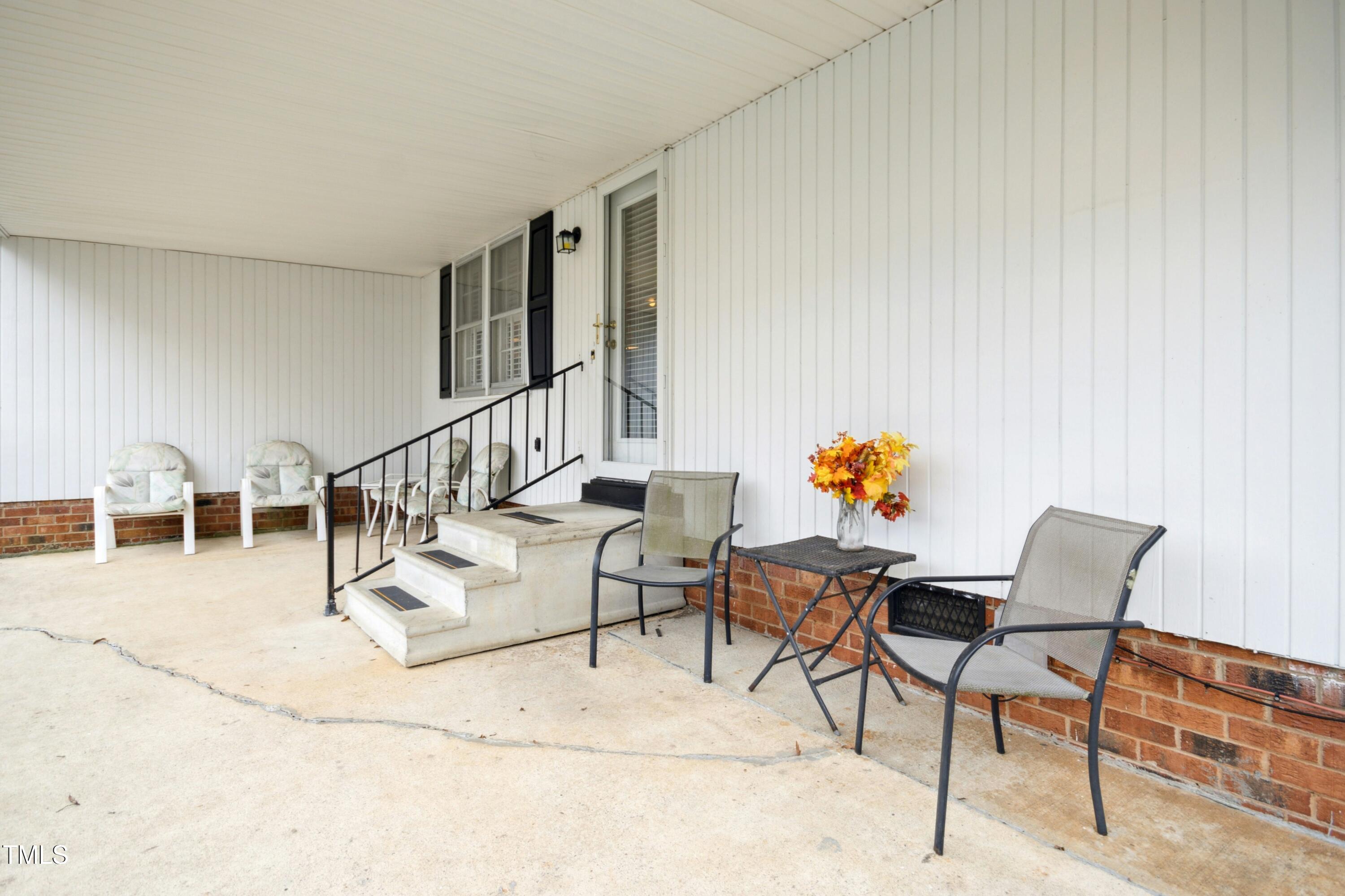 5405 Fireside Drive Raleigh, NC 27609 - Photo 20 of 29 a reading room with furniture and wooden floor