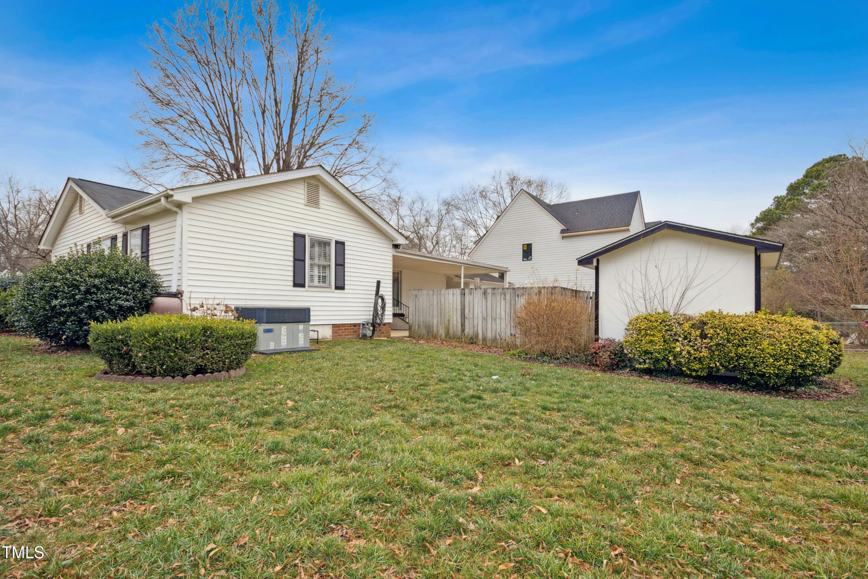 5405 Fireside Drive Raleigh, NC 27609 - Photo 25 of 29 a view of a house with a back yard