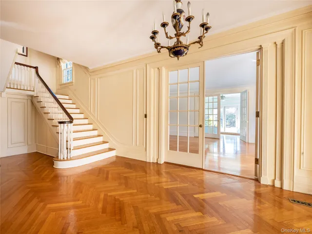 a view of entryway with wooden floor