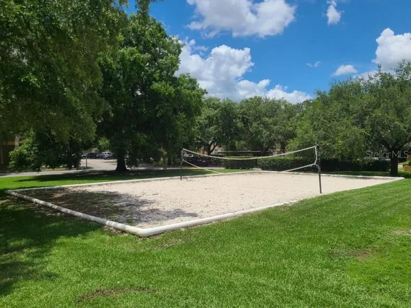 a view of a park with swings