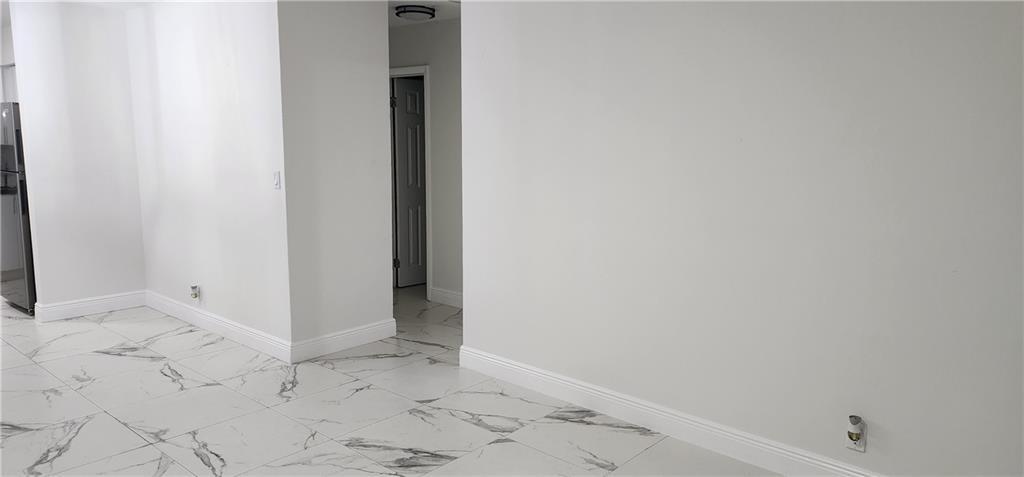 900 Southwest 11th Street, Unit 3 Hallandale Beach, FL 33009 - Photo 8 of 14 a view of an empty room