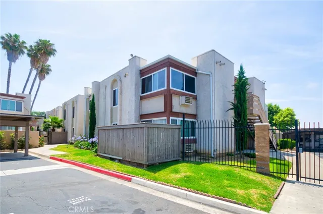 an aerial view of a city with lots of residential buildings