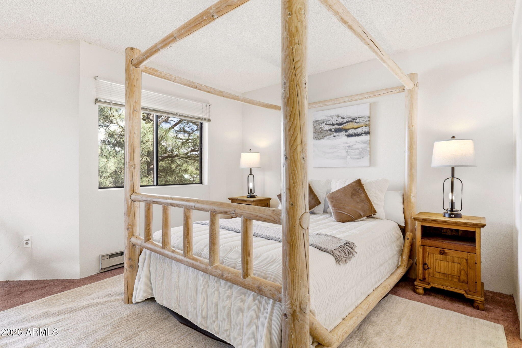 2700 South White Mountain Road, Unit 1025 Show Low, AZ 85901 - Photo 12 of 29 a bedroom with a bed and a window