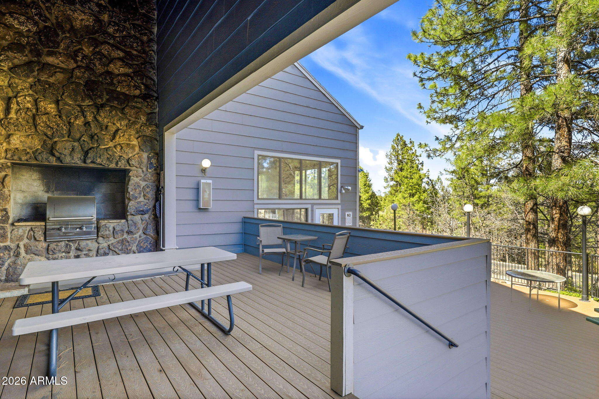 2700 South White Mountain Road, Unit 1025 Show Low, AZ 85901 - Photo 21 of 29 a outdoor space with chairs