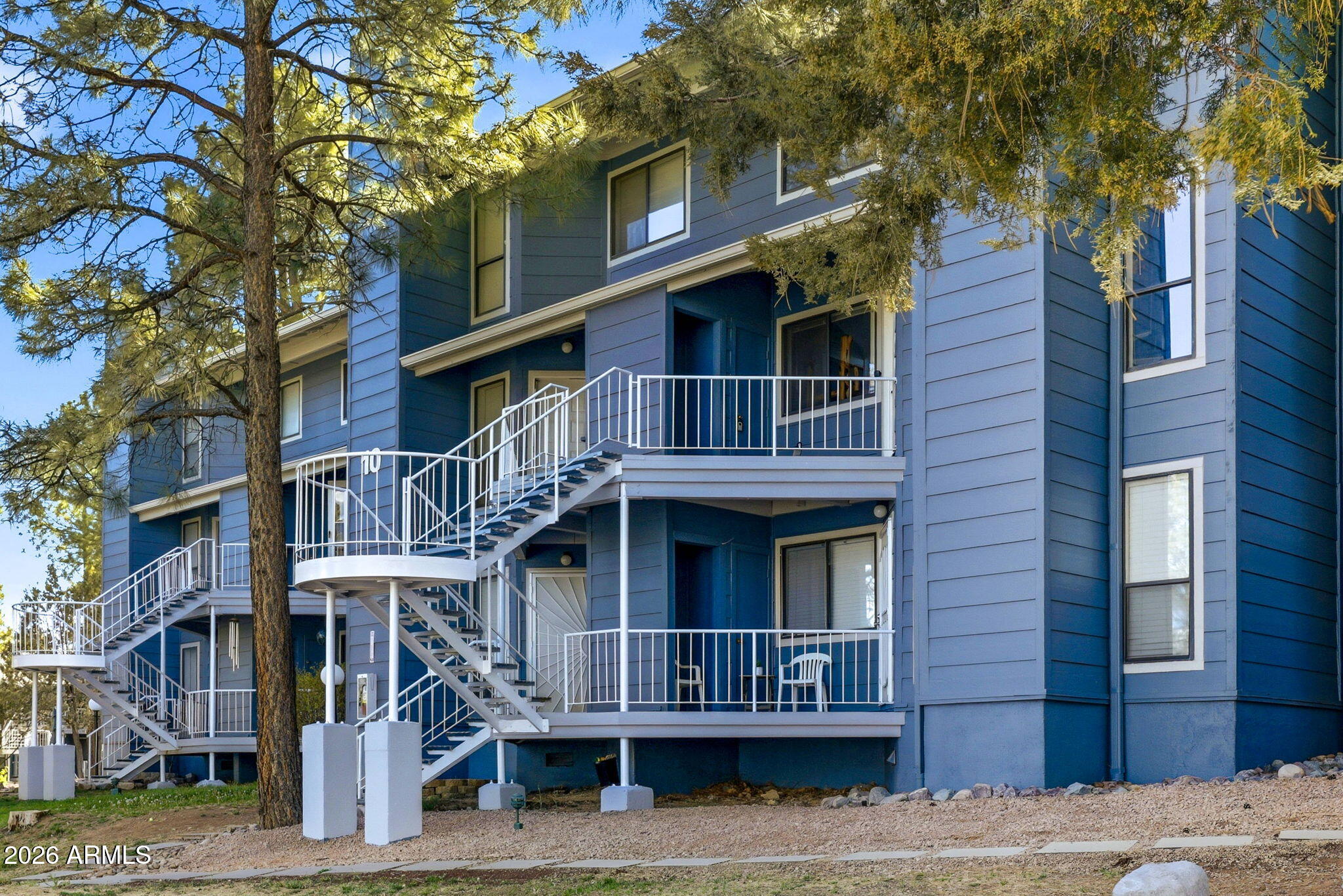 2700 South White Mountain Road, Unit 1025 Show Low, AZ 85901 - Photo 22 of 29 a view of a house with a balcony