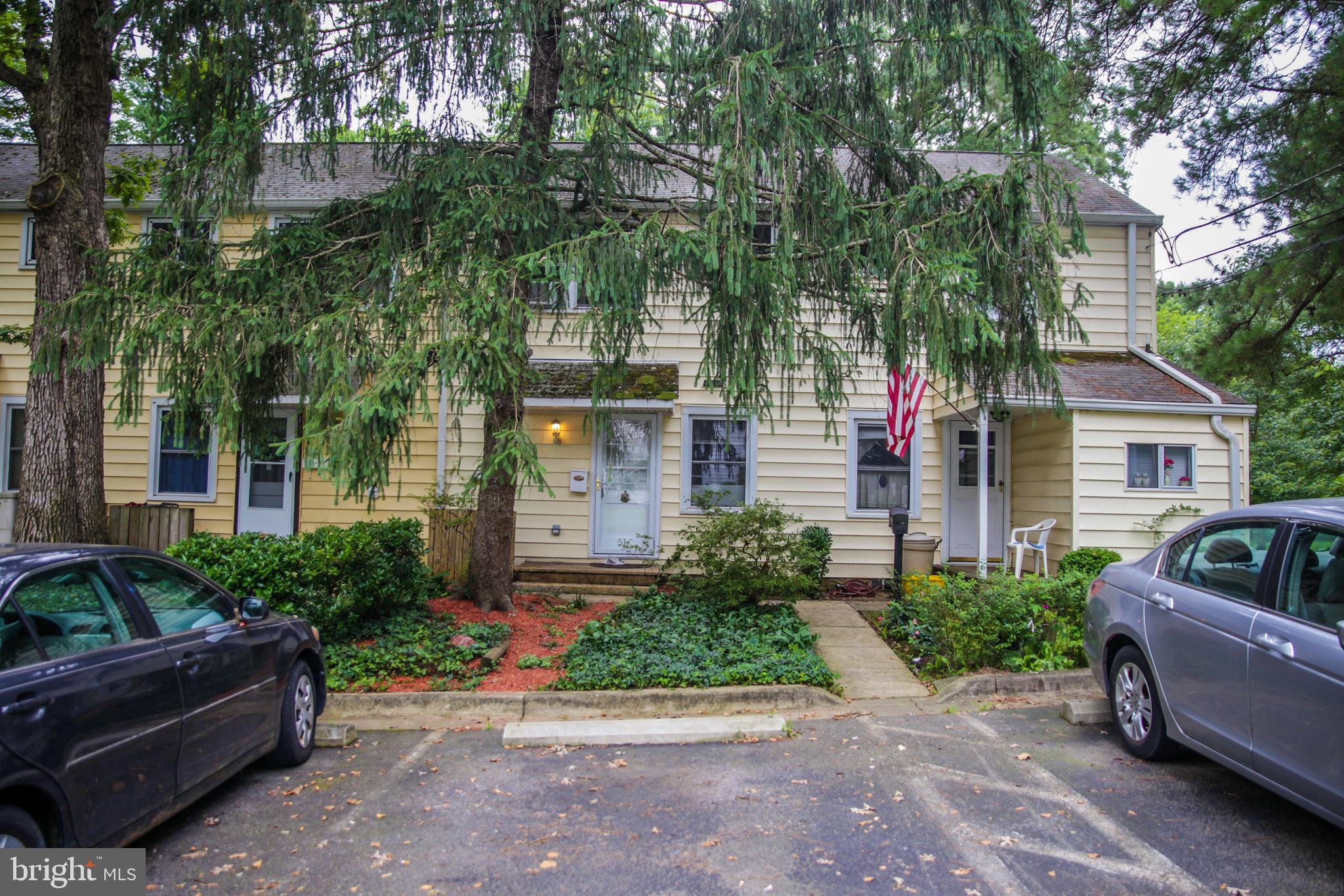 51 Ridge Road, Unit C Greenbelt, MD 20770 - Photo 1 of 27 A beautiful spruce tree shades the front yard.