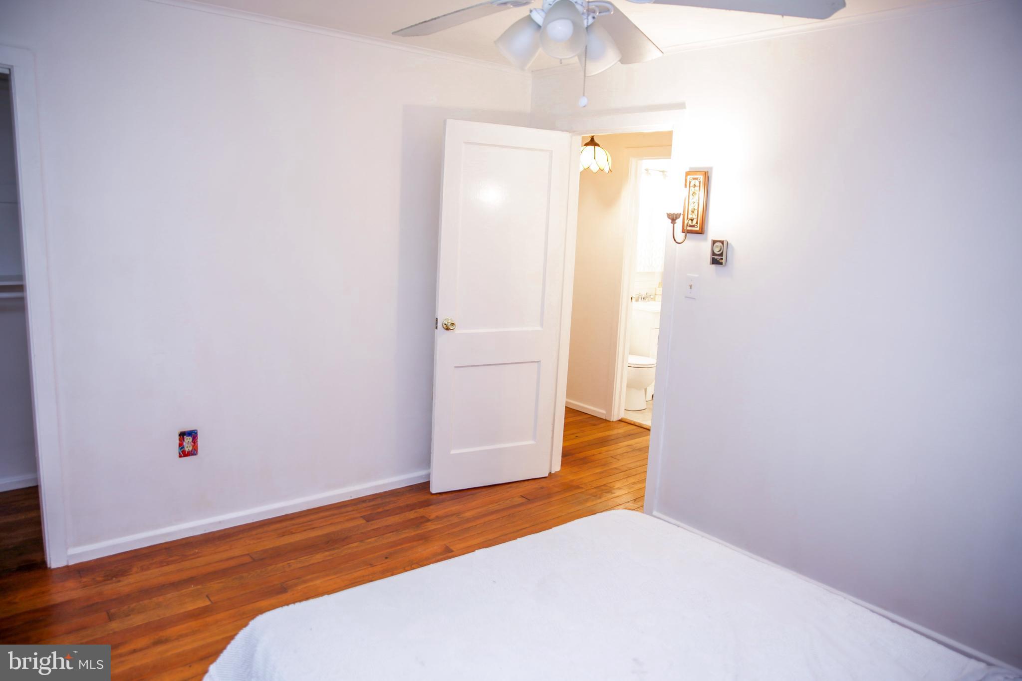 51 Ridge Road, Unit C Greenbelt, MD 20770 - Photo 19 of 27 Original two-panel wooden doors throughout