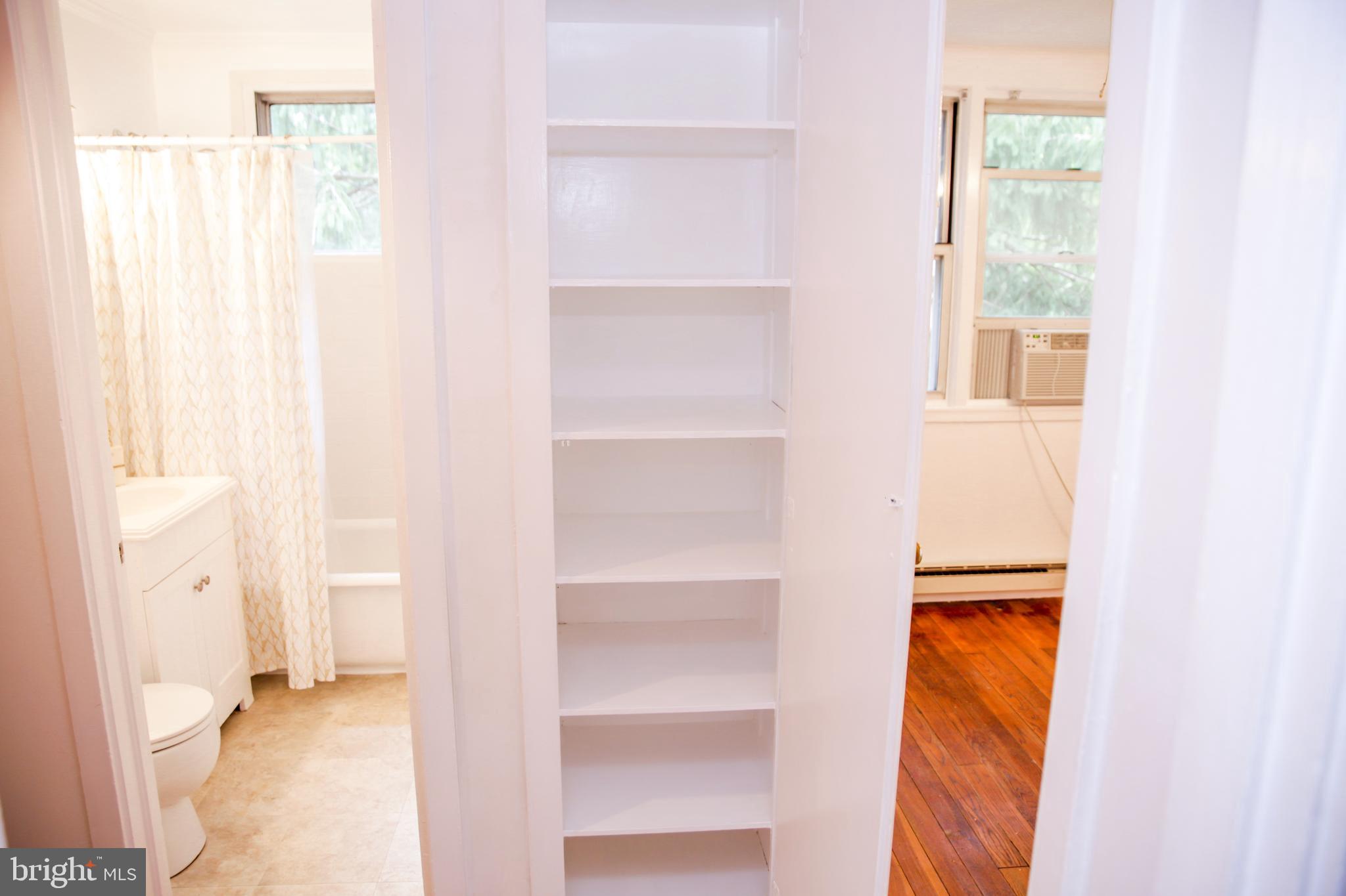 51 Ridge Road, Unit C Greenbelt, MD 20770 - Photo 20 of 27 Lots of storage in the hallway linen closet