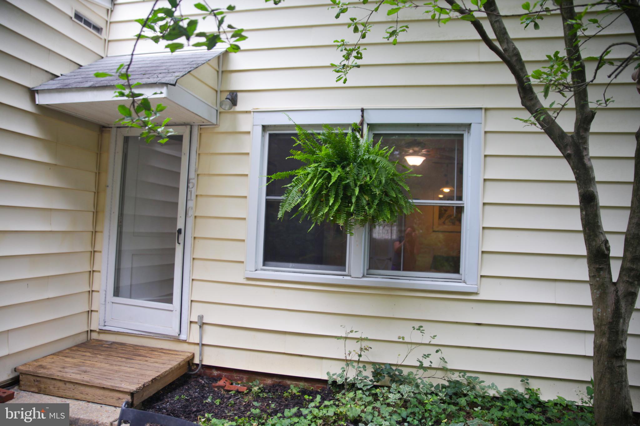 51 Ridge Road, Unit C Greenbelt, MD 20770 - Photo 27 of 27 Back stoop is covered and sheltered.