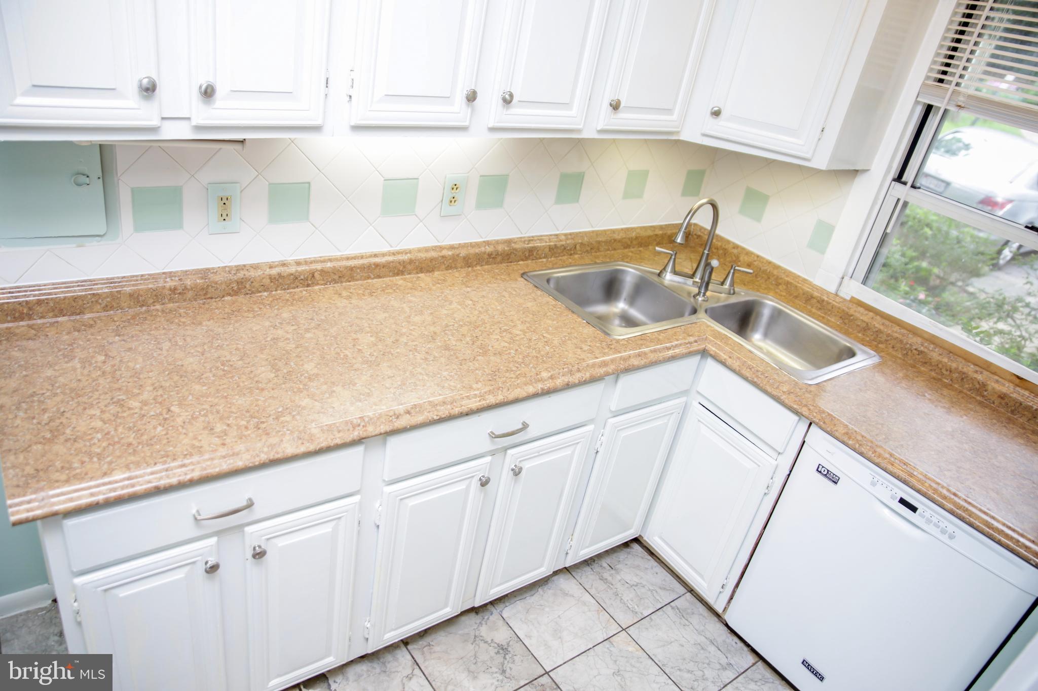 51 Ridge Road, Unit C Greenbelt, MD 20770 - Photo 4 of 27 Cook-friendly kitchen has plenty of counterspace.