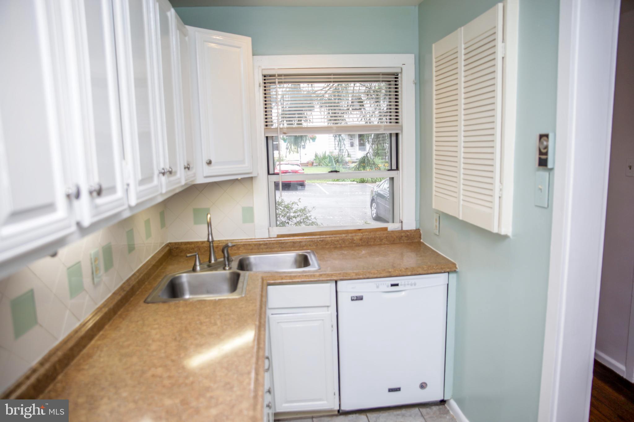 51 Ridge Road, Unit C Greenbelt, MD 20770 - Photo 6 of 27 Unique double-sink, dishwasher, big kitchen window
