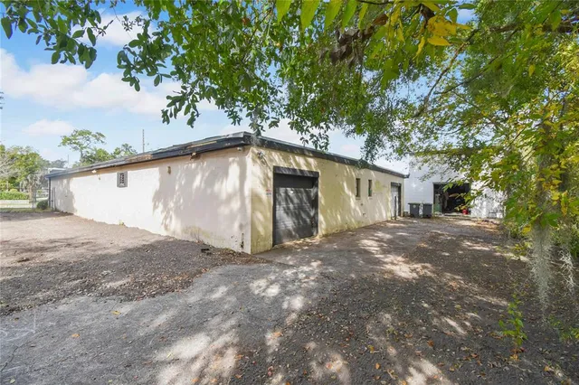 a view of a yard with tree s