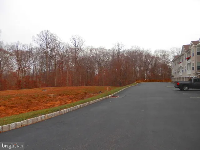 a view of a field with an outdoor space