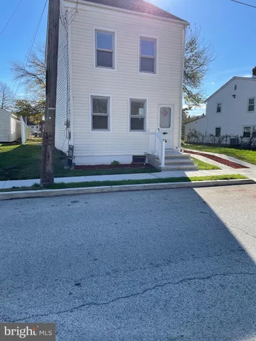 a view of a house with a swimming pool