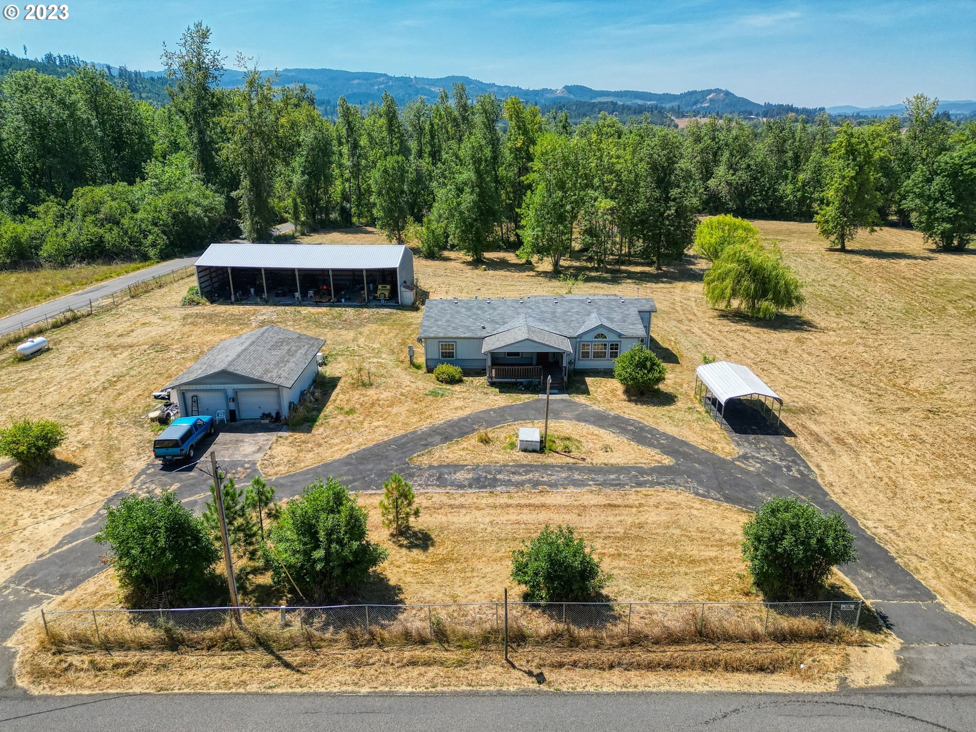35796 Enterprise Road Creswell, OR 97426 - Photo 1 of 44 a view of a swimming pool with an outdoor space
