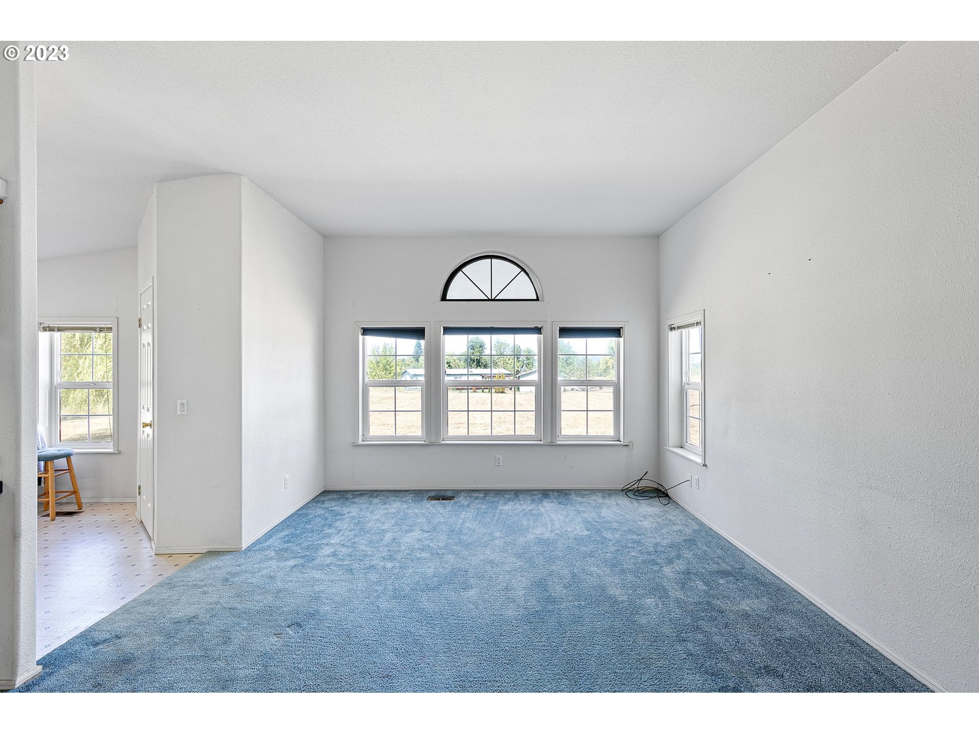 35796 Enterprise Road Creswell, OR 97426 - Photo 11 of 44 a view of an empty room with a window