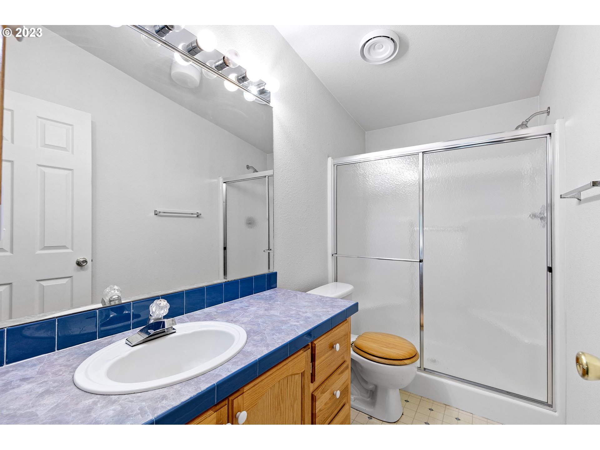 35796 Enterprise Road Creswell, OR 97426 - Photo 21 of 44 a bathroom with a sink a toilet and a mirror