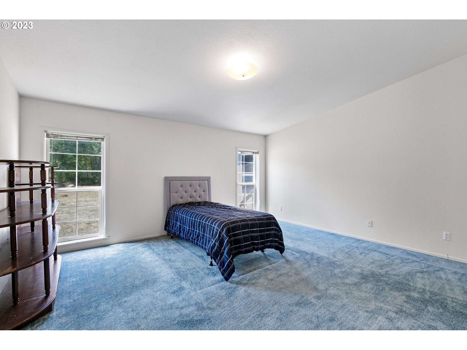 35796 Enterprise Road Creswell, OR 97426 - Photo 24 of 44 a bedroom with a bed and a window