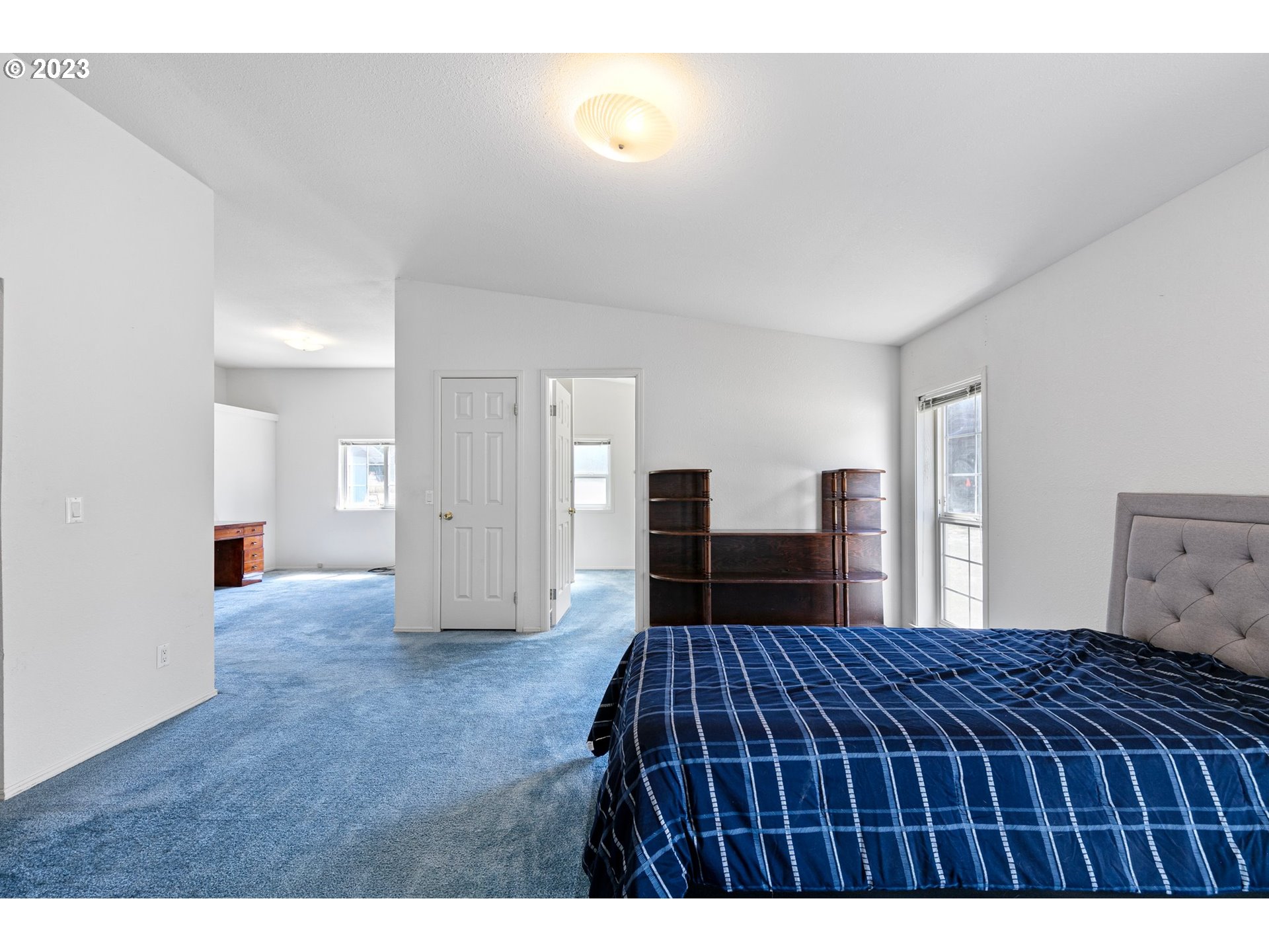35796 Enterprise Road Creswell, OR 97426 - Photo 25 of 44 a bedroom with a bed and a dresser