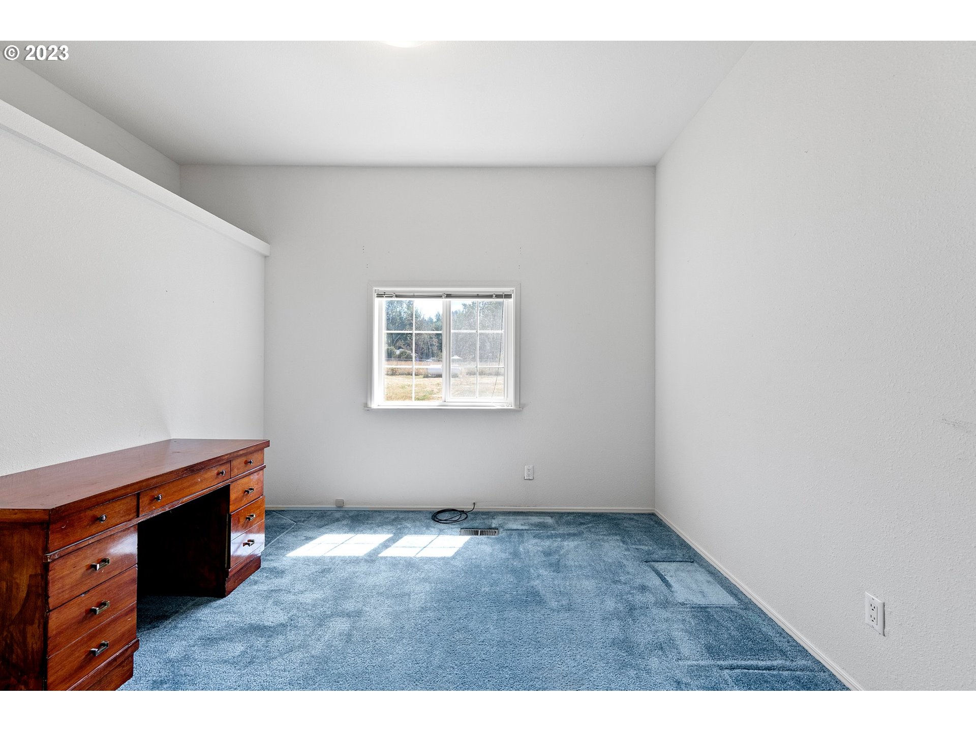 35796 Enterprise Road Creswell, OR 97426 - Photo 27 of 44 a view of an empty room with a window