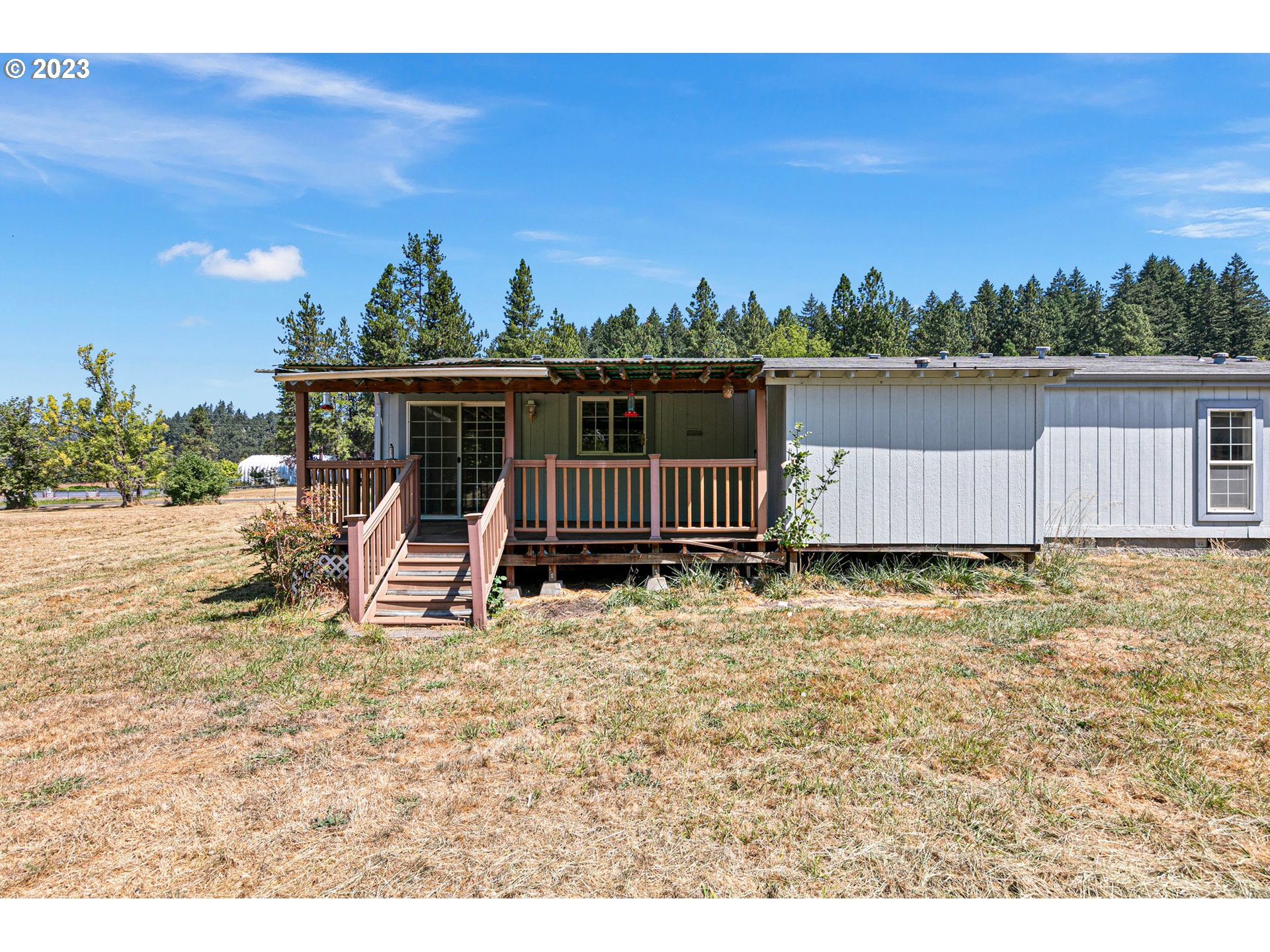 35796 Enterprise Road Creswell, OR 97426 - Photo 30 of 44 a view of a chair and table in the patio