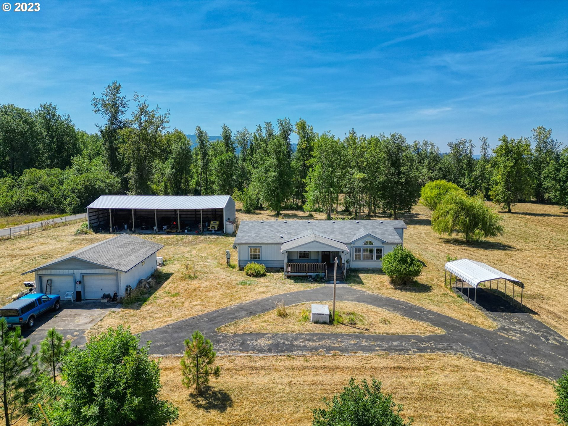 35796 Enterprise Road Creswell, OR 97426 - Photo 38 of 44 a front view of a house with swimming pool