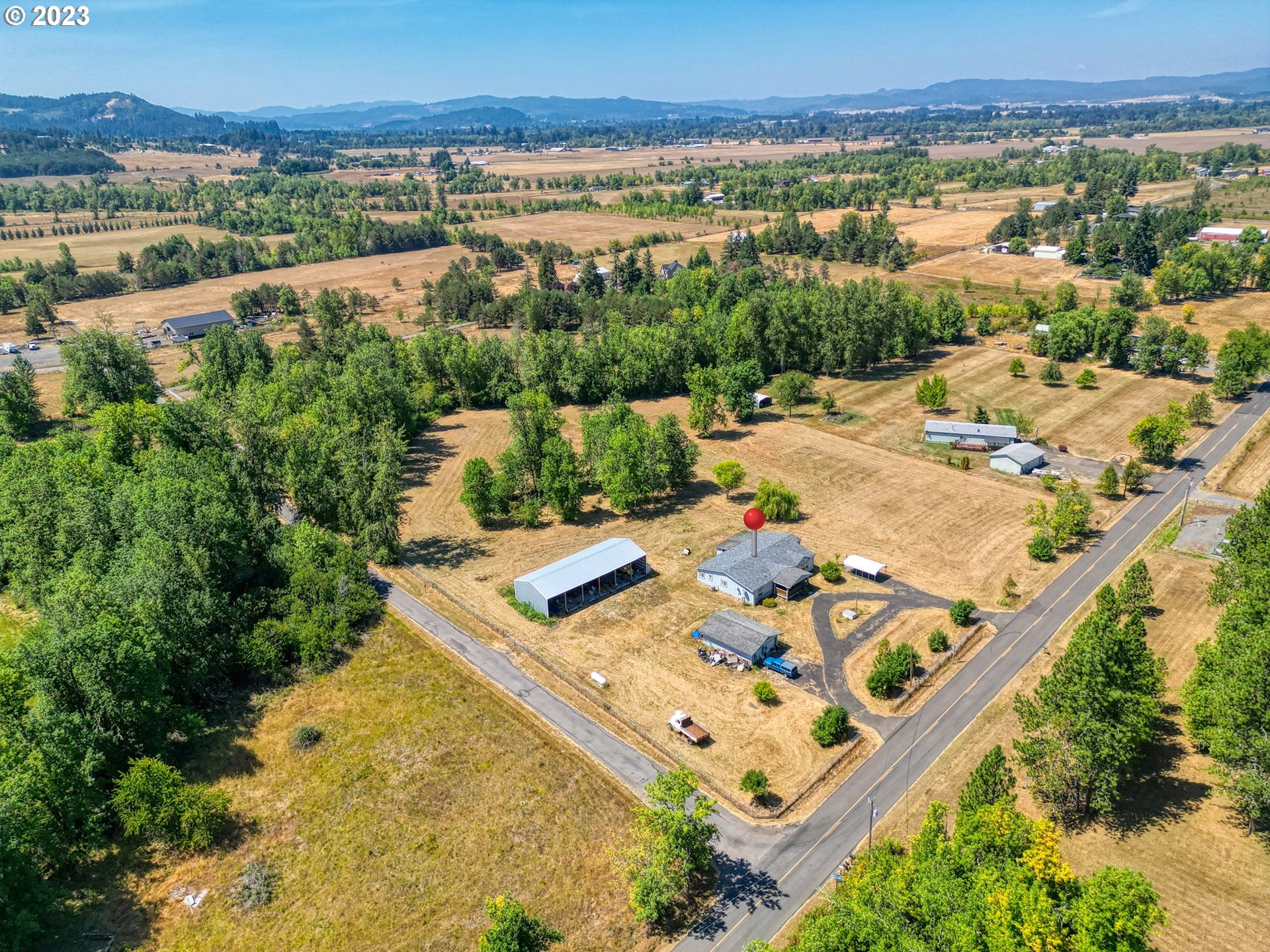 35796 Enterprise Road Creswell, OR 97426 - Photo 40 of 44 a view of a city with lawn chairs