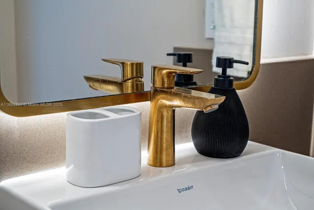 a bathroom with a mirror and a shower