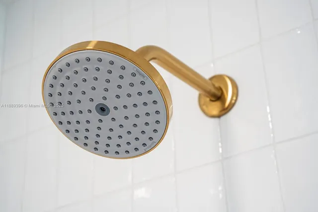 a room with pool table and flat screen tv