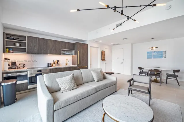 a workspace with furniture and a potted plant