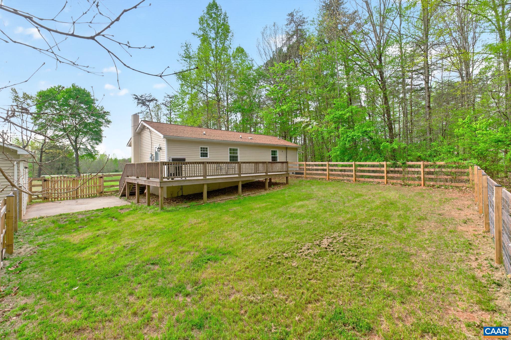 673 Cedar Lane Road Palmyra, VA 22963 - Photo 41 of 47 a view of a house with backyard and sitting area