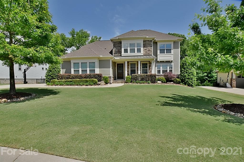 922 Castlewatch Drive Fort Mill, SC 29708 - Photo 1 of 38 a front view of a house with a yard