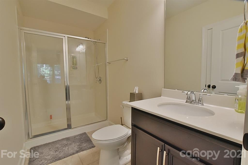 922 Castlewatch Drive Fort Mill, SC 29708 - Photo 21 of 38 a bathroom with a sink a toilet and shower